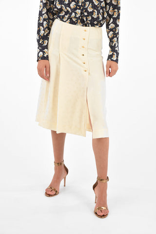 silk split-back hem and double split-front hem skirt with golden buttons