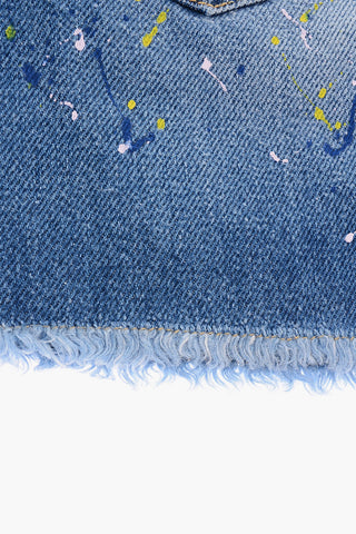 gonna in denim con schizzi di vernice