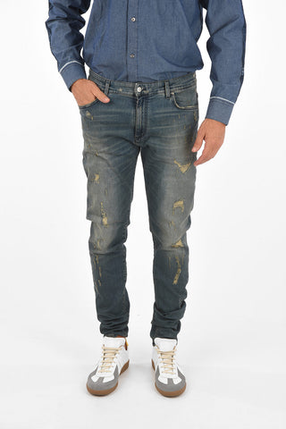 slim fit REPAIRER distressed jeans