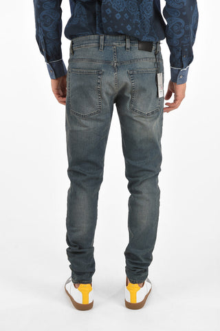 slim fit REPAIRER distressed jeans