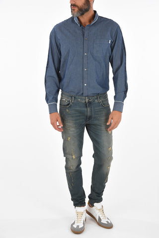 slim fit REPAIRER distressed jeans