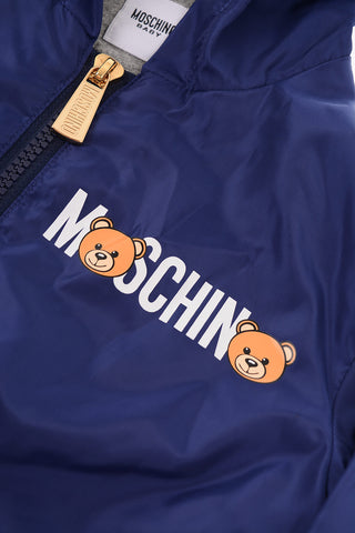 hooded outerwear with zip closure