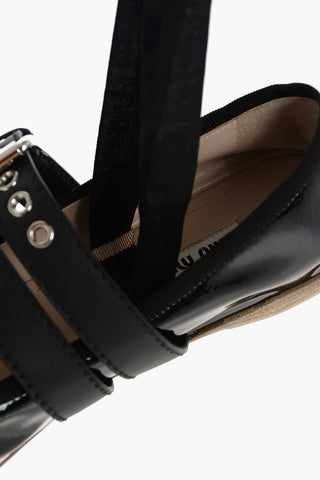 Ballerine allacciate in vernice con cinturini