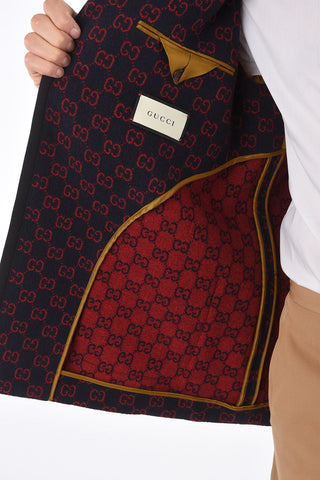 Embroidered blazer with golden buttons