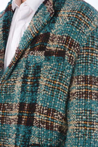 cappotto con abbottonatura nascosta