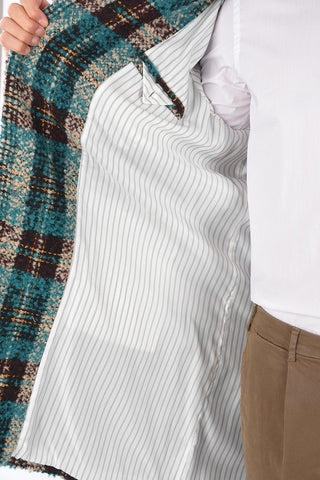 cappotto con abbottonatura nascosta