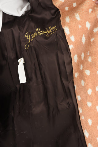 cappotto in ecopelliccia con cintura