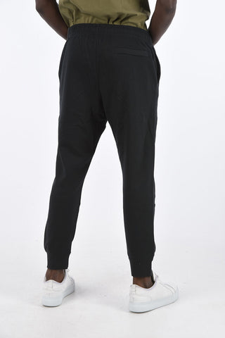Joggers a tinta unita con logo ricamato