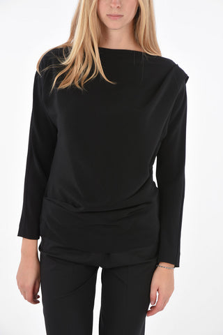 Blusa asimmetrica con chiusura zip laterale