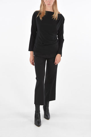 Blusa asimmetrica con chiusura zip laterale