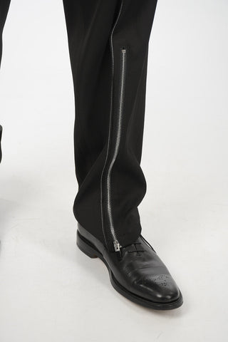 pantalone con passanti e zip alla caviglia