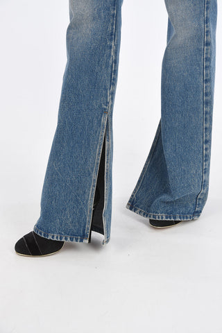 jeans bootcut con spacco alla caviglia