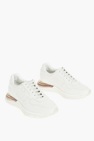 Sneakers in Pelle con Suola Bombata con Dettagli Metallizzati