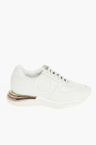 Sneakers in Pelle con Suola Bombata con Dettagli Metallizzati