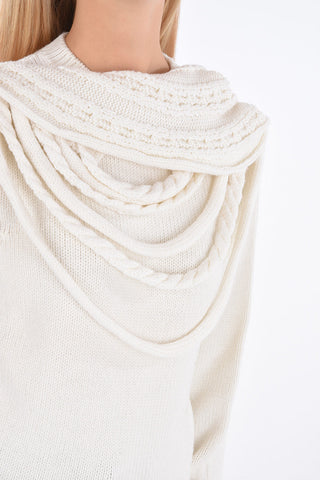 maglia in lana con collo intrecciato