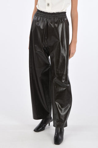 Shiny Leather Pants with Waistband and Ankle Velcro Detail