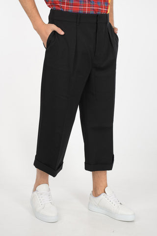 pantalone cropped a una pince in lana ad orlo con risvolto