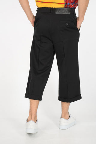 pantalone cropped a una pince in lana ad orlo con risvolto