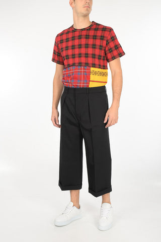 pantalone cropped a una pince in lana ad orlo con risvolto