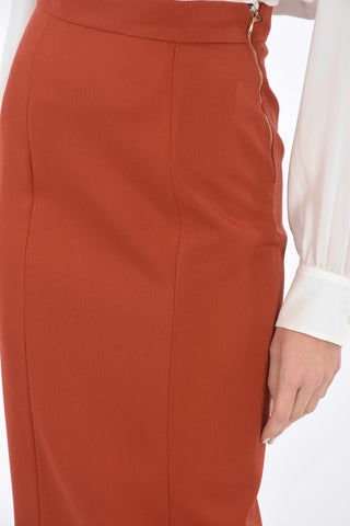 wool split-back hem below knee  pencil skirt