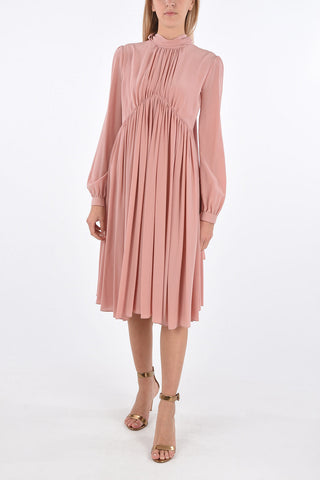 silk Under the Knee tie neck dress with pleates