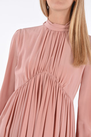 silk Under the Knee tie neck dress with pleates