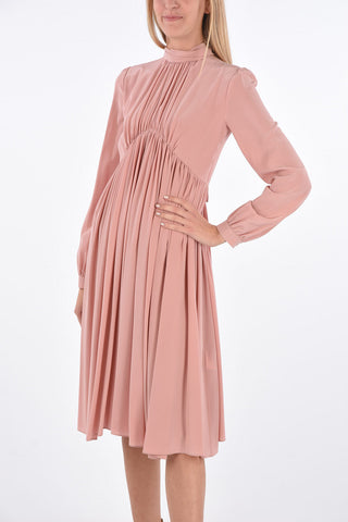 silk Under the Knee tie neck dress with pleates