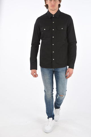 camicia con bottoni automatici