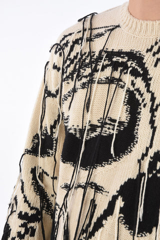 Crew Neck Two Tone Pullover with Skull Motif and Pulled Wires