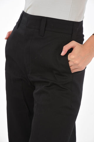 pantalone flare a vita alta con tasca diagonale