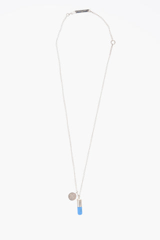 Silver necklace with pill pendant