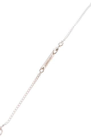 Silver necklace with pill pendant
