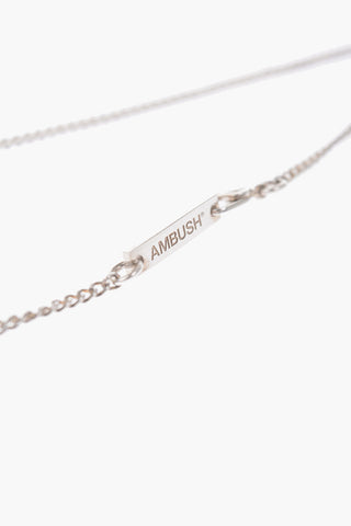Silver necklace with pill pendant