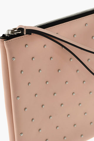 Clutch in pelle borchiata