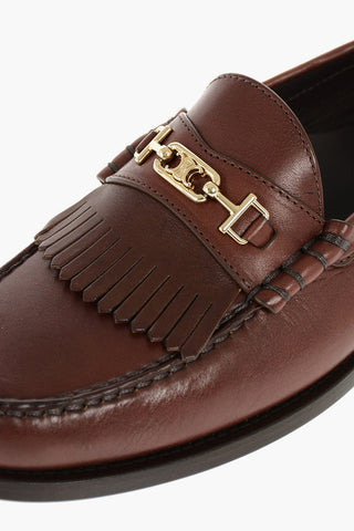 TRIOMPHE Leather Loafers with Buckle and Fringes