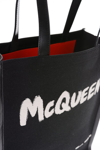 jacquard graffiti printed tote bag with leather details