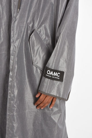 hooded raincoat with zip closure