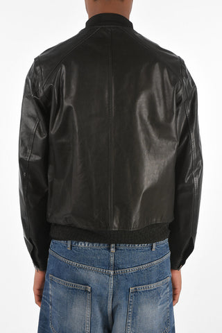 bomber in pelle con bottoni automatici