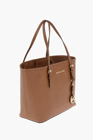 Leather JET SET TRAVEL Bag with Metal Logo and Charm