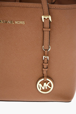 Leather JET SET TRAVEL Bag with Metal Logo and Charm