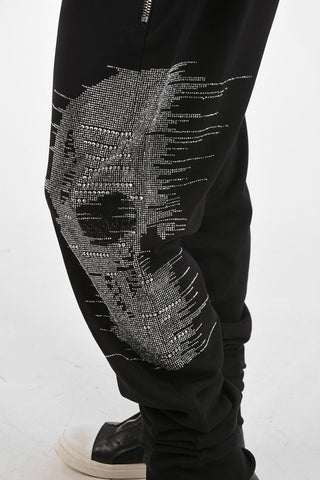 HOMME rhinestone embellished HALF SKULL jogger pants