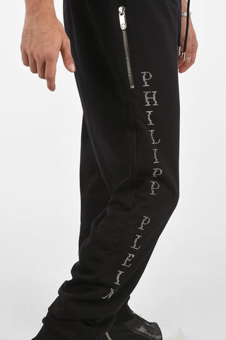 HOMME rhinestone embellished HALF SKULL jogger pants