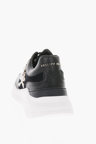 sneakers in pelle e tessuto con teschio