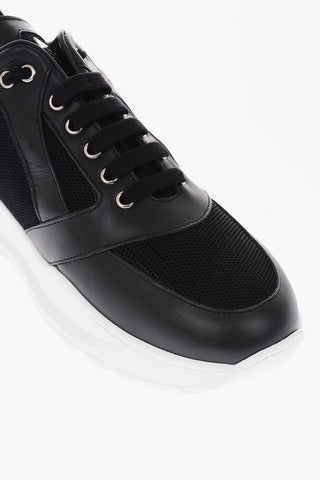 sneakers in pelle e tessuto con teschio