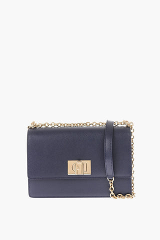 textured leather crossbody bag with chain shoulder strap