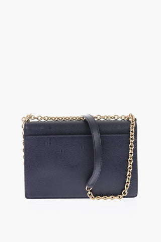 textured leather crossbody bag with chain shoulder strap