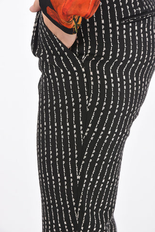 COUTURE logo-embroidered all over double pleat PINSTRIPE PLEIN pants with ankle zip