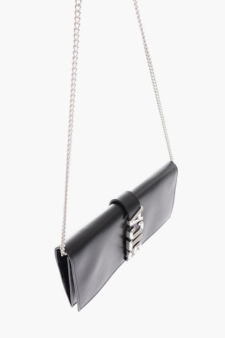 Clutch in pelle con tracolla removibile