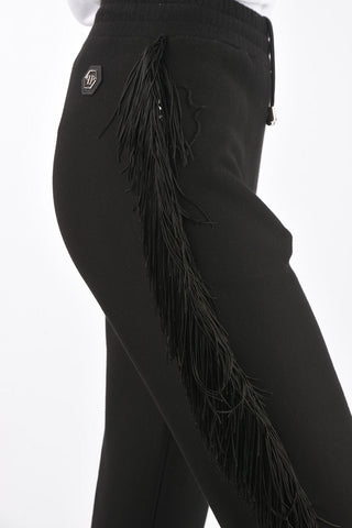 COUTURE Pantaloni gogger REVENGE con frange e borchie