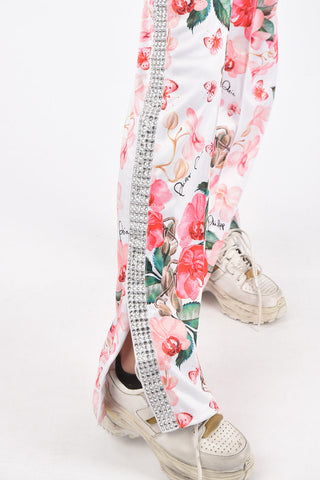 COUTURE floral-printed Jogging pants with side band rhinestone embellished